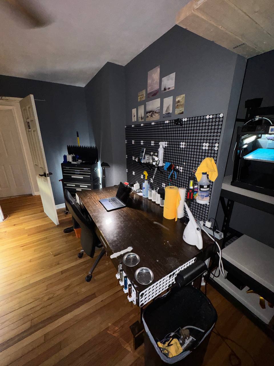 Print lab workbench with pegboard and tools